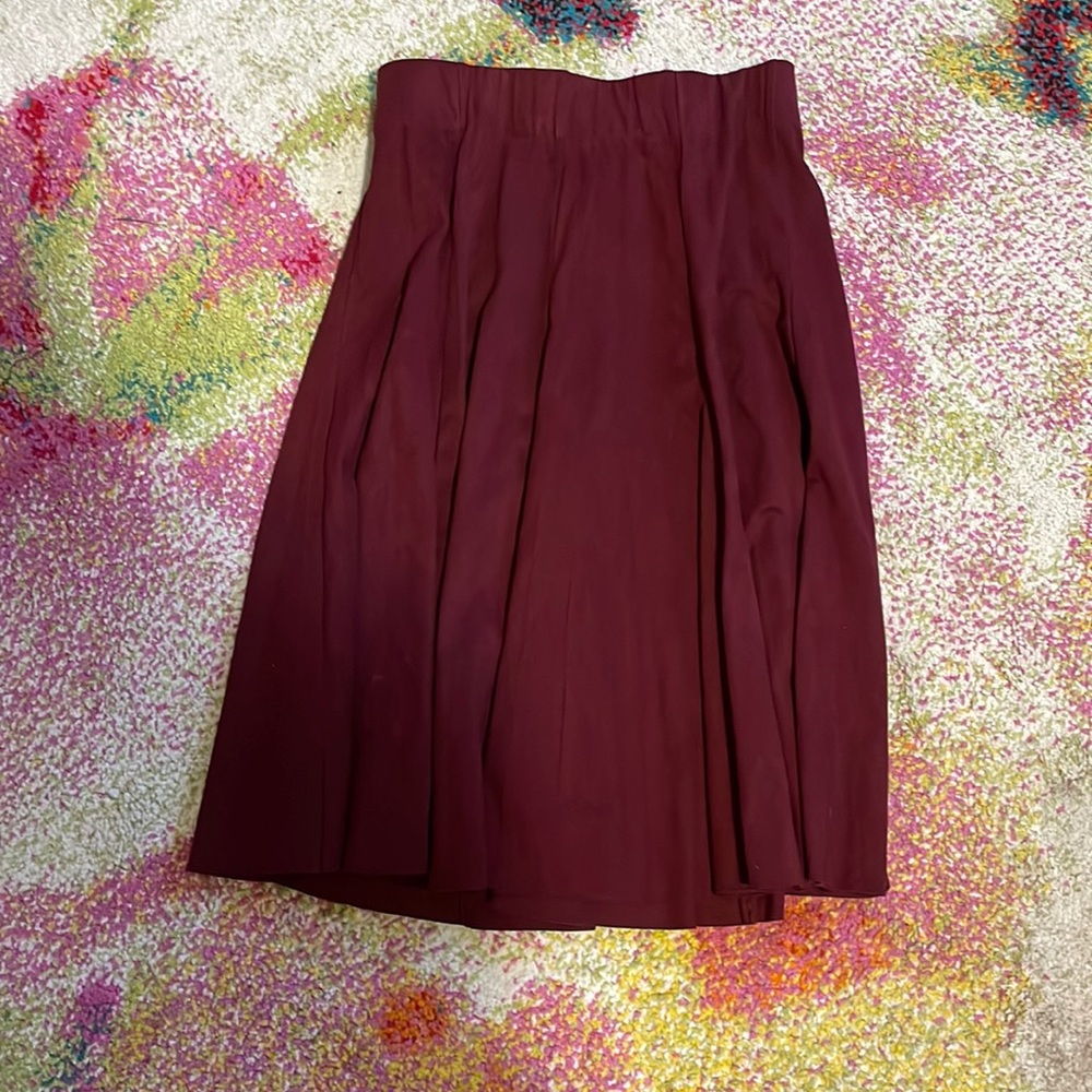 Orly skirt waist stretches 25 to 30 length 23